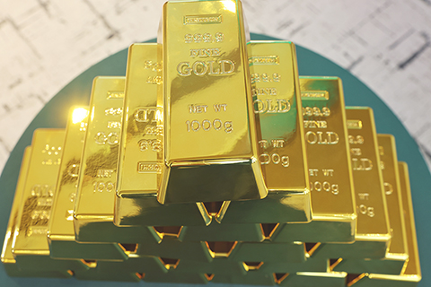 ◎ 一月二十九日,香港恆生投資管理有限公司推出的「恆生黃金ETF」(股份代號:3170)在港交所上市,為全港首隻可於銀行兌換實物黃金的ETF。(香港中通社記者謝光磊 攝)